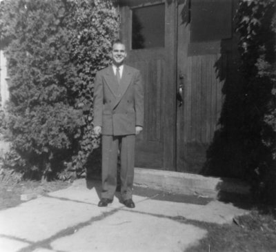 Student in front of Willison Hall, Waterloo College