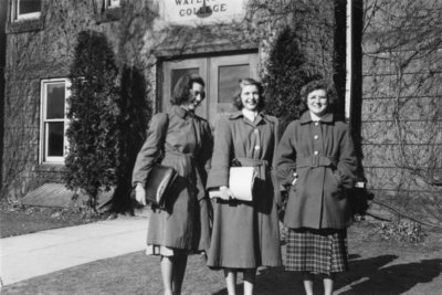 Three students in front of Willison Hall, Waterloo College