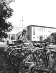 Woman at bicycle rack, Wilfrid Laurier University