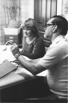 Lawrence Toombs and woman working with archaeological tools