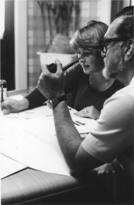 Lawrence Toombs and woman working with archaeological tools