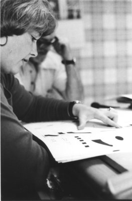 Woman working with archaeological tools