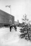 Students building snowman at Wilfrid Laurier University