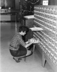 Woman using card catalogue in the Waterloo Lutheran University Library