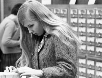 Woman using card catalogue Waterloo Lutheran University Library