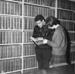Two students in the Waterloo Lutheran University Library