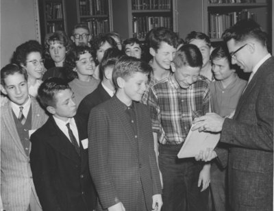 Erich Schultz with a group of children