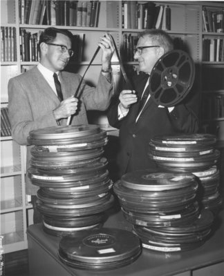 Henry Endress and Erich Schultz examining film