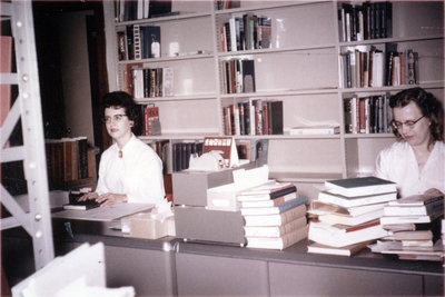 Staff members in Waterloo Lutheran University library, Willison Hall