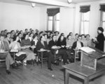 Flora Roy and students in classroom