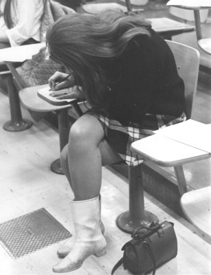 Waterloo Lutheran University student sitting at a desk