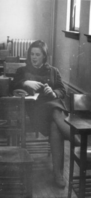 Waterloo Lutheran University student seated at a desk