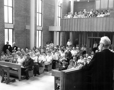 Rev. Lotz leading service, Keffer family reunion, 1964