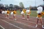 Waterloo Lutheran University cheerleaders at football game