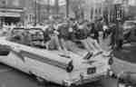 Waterloo College cheerleaders in Homecoming Parade, 1957