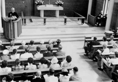 Albert Lotz speaking during the service of dedication for the Waterloo Lutheran Seminary Building