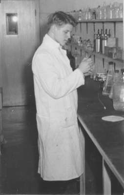 Waterloo College student in a science laboratory