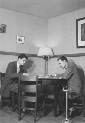 Student in men's common room, Waterloo College