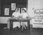 Two nursing students sitting at a table