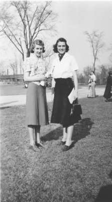 Two women standing outdoors