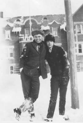 Two Waterloo College School students standing in front of Willison Hall