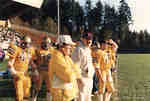 Rich Newbrough and football players during 1987 Western Bowl