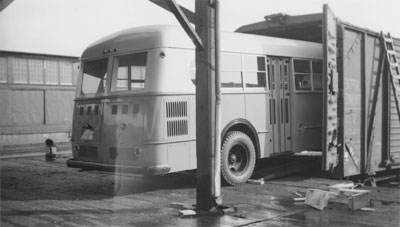 Unloading Bus from Rail Car