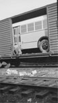 Unloading Bus from Rail Car