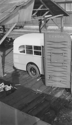 Unloading Bus from Rail Car