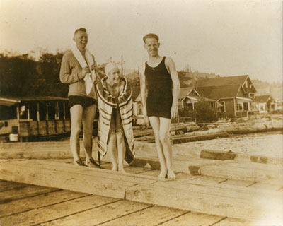 Ted Grout & Mrs. T. Grout and Andrew Reid (L to R) on Hollyburn wharf