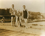 Ted Grout & Mrs. T. Grout and Andrew Reid (L to R) on Hollyburn wharf