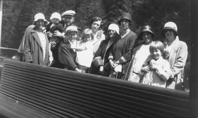 Mr. Lunn (3rd from L) & Mrs. Lunn (9th from L) with family and friends