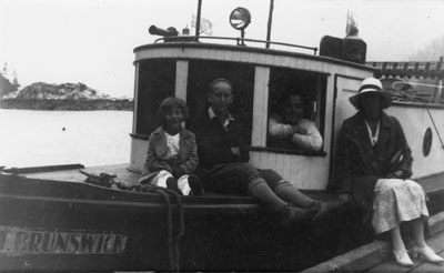 Lunn family at Whyte Cliff on the boat "Mr. Brunswick" owned by Mt. Rundell