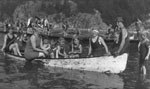 Mrs. Lunn (L) and Mrs. Allison (R) canoeing with children in Horseshoe Bay