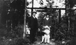 Mr. and Mrs. Lunn and child (Leonore?) at Deep Cove Tea Gardens