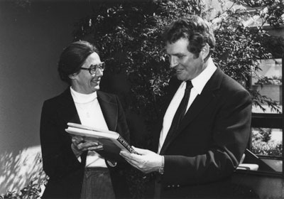 Gordon Gibson Jr. Making the First Donation to the Friends of the Library