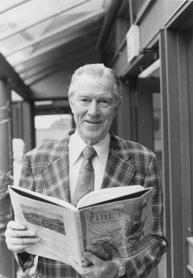 Mr. W.D.M. Patterson Donating a Book to the West Vancouver Memorial Library