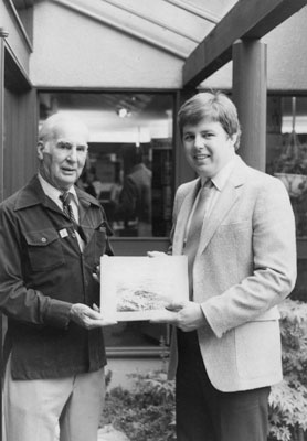 Don Mills Accepting a Book Donation