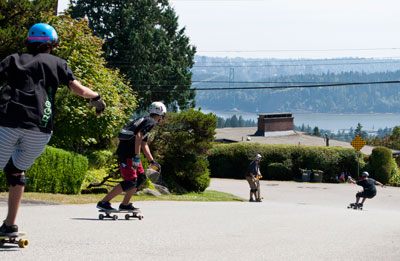 Longboarders at Queens & 12th