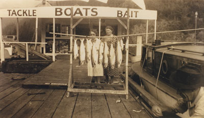 Two ladies in front of their fishing catch at Sewell's Marina