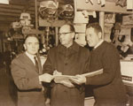 Men in Sewell Boat House