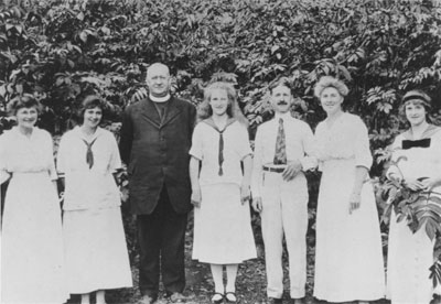 The Kloepfer family, pioneers of St. Anthony's Roman Catholic Church, with Father Boniface O.F.M.