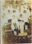 Archbishop Duke with first holy communion class