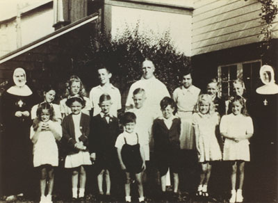 Father N.J. Windt and the Sunday School class at St. Anthony's Church
