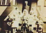 Father D. J. Casey and the first communion class