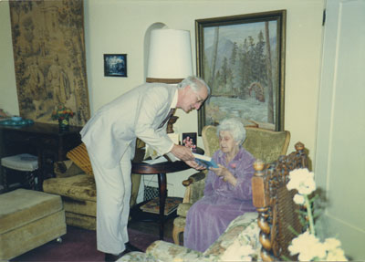 Acting Mayor, Rod Day, presenting Gertrude Lawson with a dedicated copy of &quot;A Place of Excellence&quot;