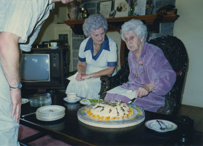 Gertrude Lawson seated with Grace Harrison at her 95th birthday party