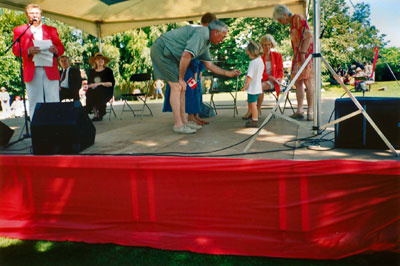 Young Girl Receiving Canada Day Pin & Flag