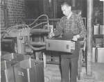 Sunshine Waterloo Company Limited, Man Working on Garbage Cans