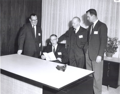 Sunshine Waterloo Company Limited, Men Viewing Desk